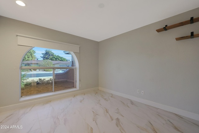 empty room featuring a barn door