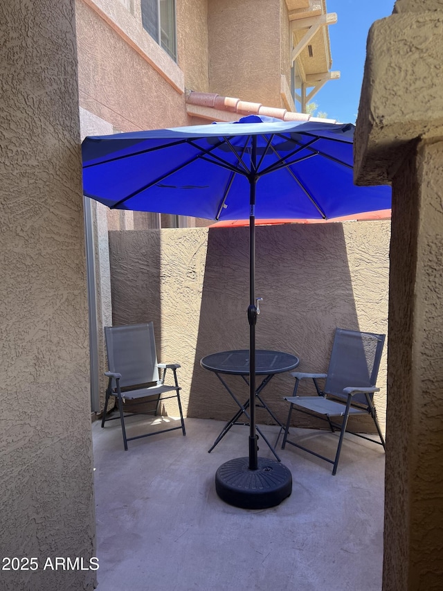 view of patio with fence