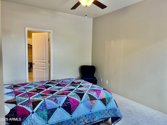 bedroom featuring a ceiling fan and carpet flooring