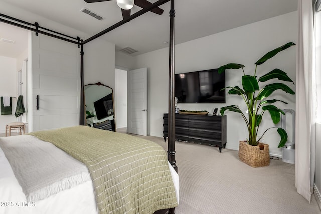 1931 E Aster Pl, Chandler, AZ 85286 - carpeted bedroom featuring a ceiling fan and a barn door