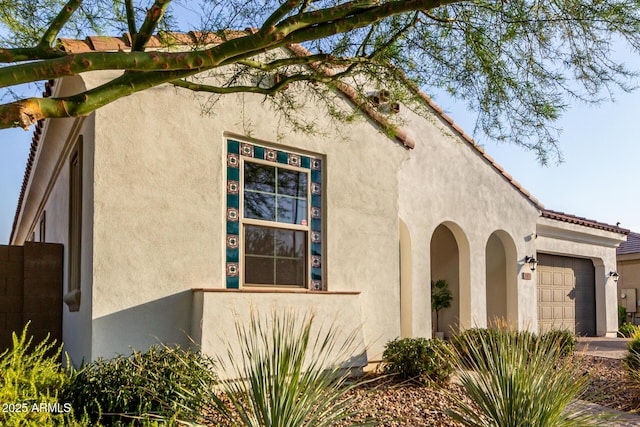 1931 E Aster Pl, Chandler, AZ 85286 - view of property exterior featuring an attached garage and stucco siding
