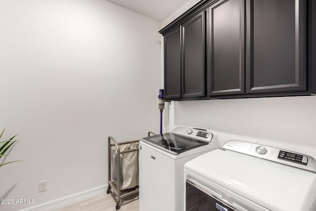 1931 E Aster Pl, Chandler, AZ 85286 - laundry area with cabinet space and washing machine and clothes dryer
