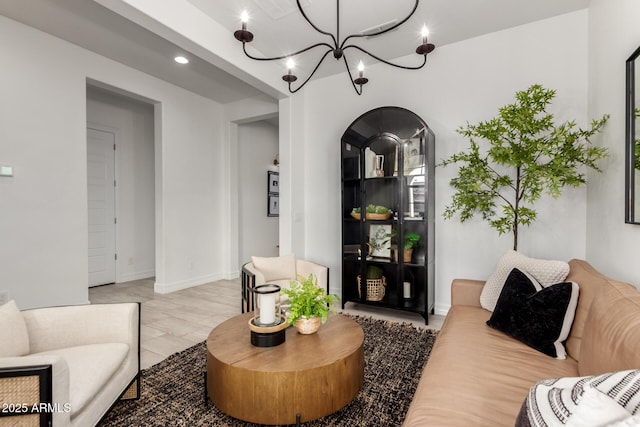 1931 E Aster Pl, Chandler, AZ 85286 - living room with arched walkways and a chandelier