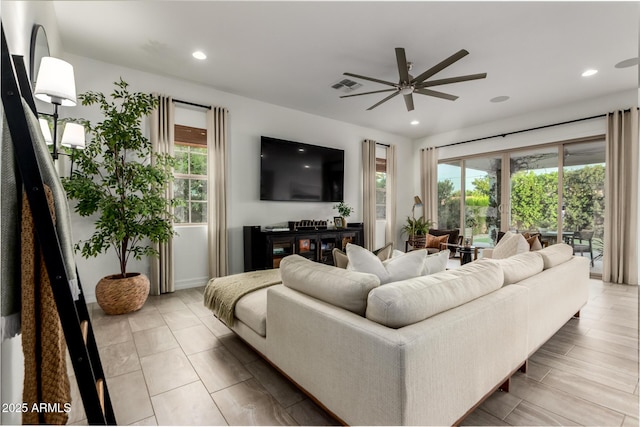1931 E Aster Pl, Chandler, AZ 85286 - living room featuring a ceiling fan, healthy amount of natural light, and recessed lighting