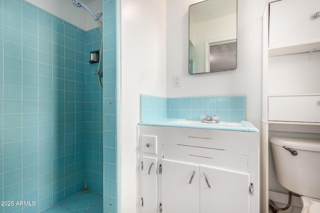 2308 W Marlette Ave, Phoenix, AZ 85015 - full bath featuring vanity, tasteful backsplash, toilet, and tiled shower