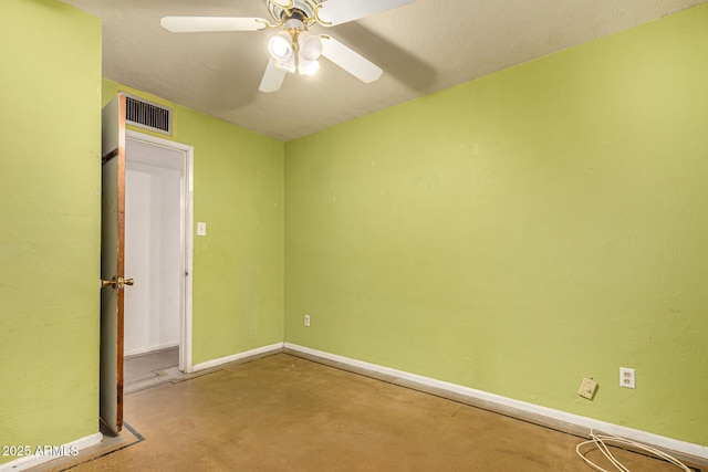 2308 W Marlette Ave, Phoenix, AZ 85015 - spare room with baseboards, ceiling fan, concrete flooring, and visible vents
