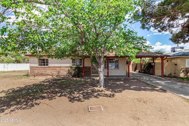 2308 W Marlette Ave, Phoenix, AZ 85015 - view of front of house with fence, an attached carport, and driveway