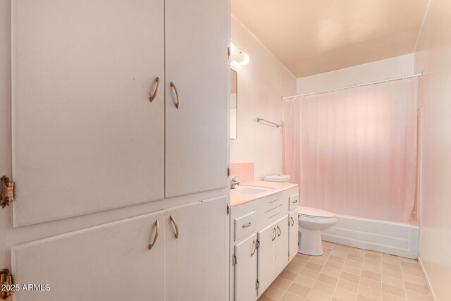 2308 W Marlette Ave, Phoenix, AZ 85015 - bathroom featuring toilet, shower / bath combo with shower curtain, and vanity