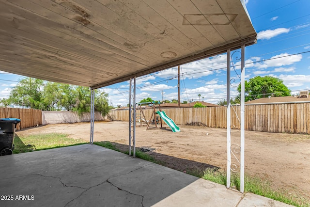 2308 W Marlette Ave, Phoenix, AZ 85015 - view of patio with a fenced backyard and a playground