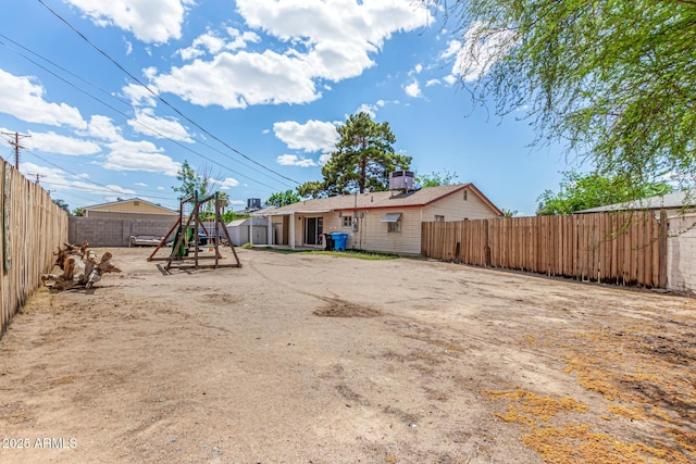 2308 W Marlette Ave, Phoenix, AZ 85015 - view of yard featuring a fenced backyard and a playground