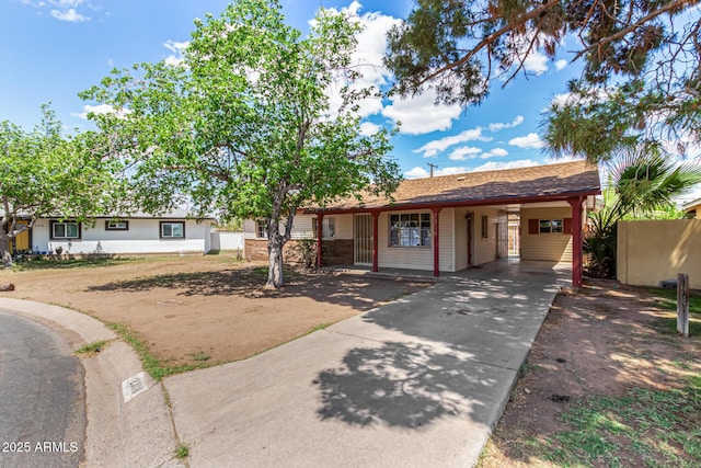 2308 W Marlette Ave, Phoenix, AZ 85015 - ranch-style house with driveway and an attached carport