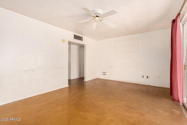 2308 W Marlette Ave, Phoenix, AZ 85015 - empty room with visible vents, finished concrete floors, and ceiling fan