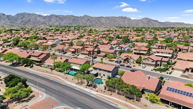 aerial perspective of suburban area with a mountain backdrop