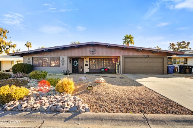 single story home featuring a garage