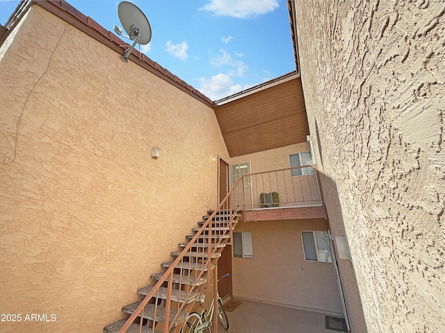 view of property with stairs