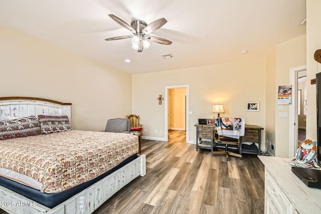 bedroom with hardwood / wood-style flooring and ceiling fan