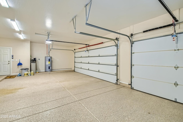 garage featuring a garage door opener and water heater