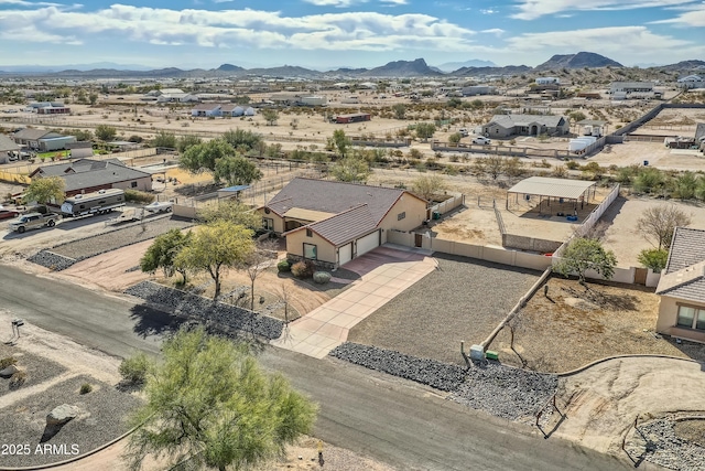 drone / aerial view featuring a mountain view