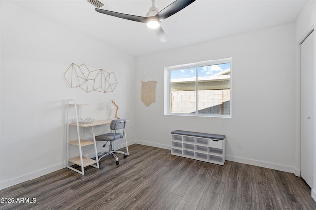 office area featuring a ceiling fan, baseboards, and wood finished floors