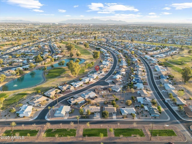 aerial view featuring a residential view and a water and mountain view