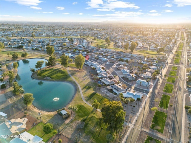 bird's eye view featuring a residential view and a water view