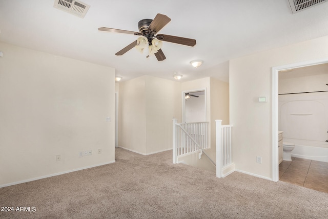 spare room with light colored carpet