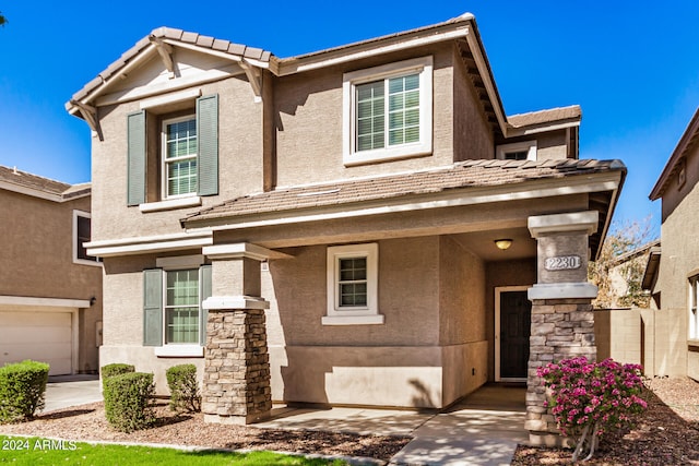 view of front of home with a garage