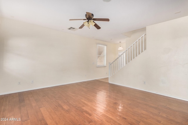 interior space featuring hardwood / wood-style flooring and ceiling fan