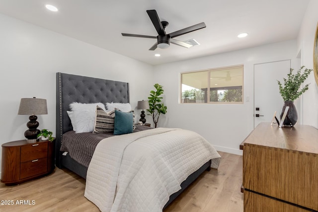 bedroom featuring ceiling fan and light wood-type flooring