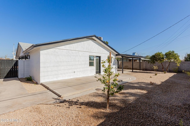 view of home's exterior featuring a patio area