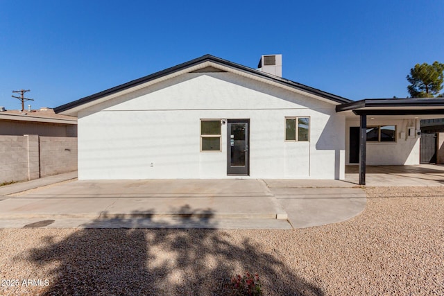 rear view of house featuring a patio area