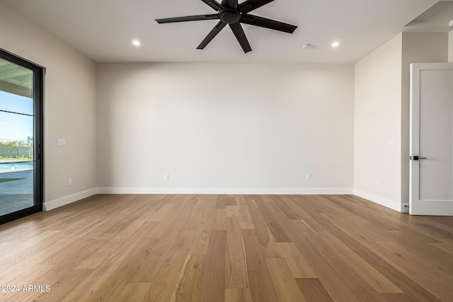 spare room with a ceiling fan, recessed lighting, and light wood-style flooring