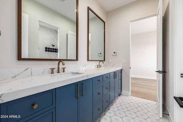 bathroom featuring vanity and hardwood / wood-style floors