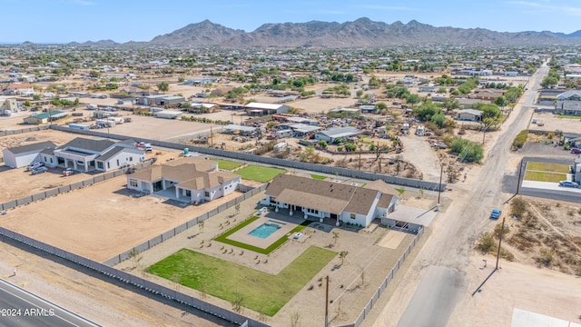 drone / aerial view featuring a mountain view