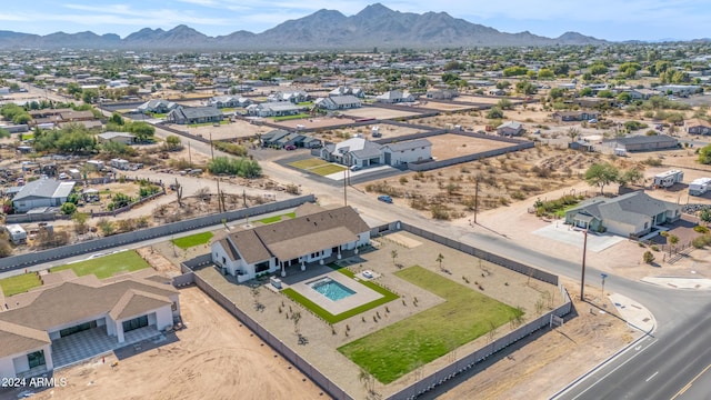 birds eye view of property featuring a mountain view and a residential view