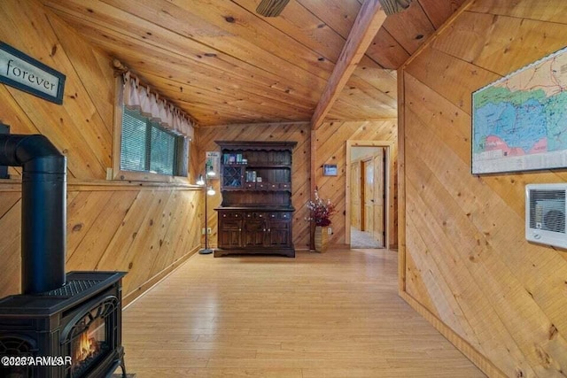 hallway with hardwood / wood-style flooring, wooden ceiling, vaulted ceiling, and wooden walls