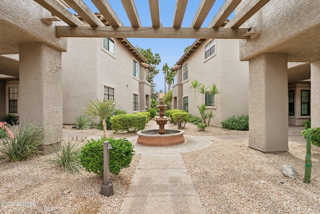 view of community featuring a pergola