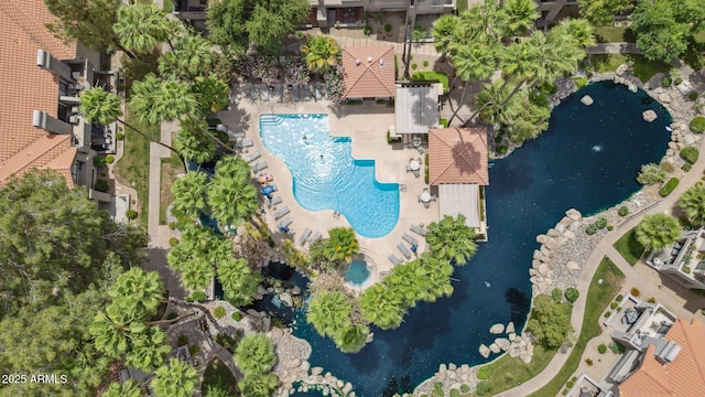 drone / aerial view of a pool