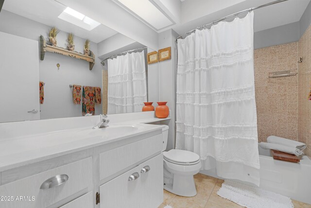9621 E Calgary Ave, Sun Lakes, AZ 85248 - full bath with toilet, tile patterned floors, vanity, and shower / bath combination with curtain