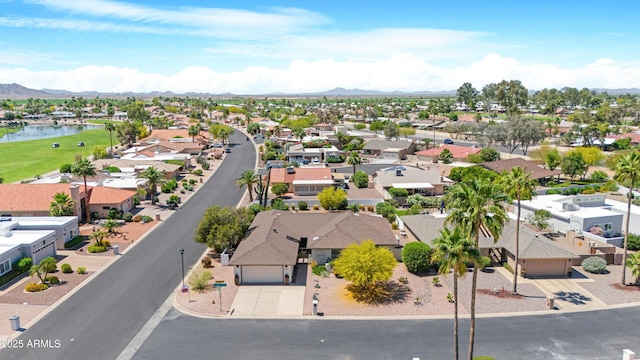 9621 E Calgary Ave, Sun Lakes, AZ 85248 - aerial perspective of suburban area with a water and mountain view