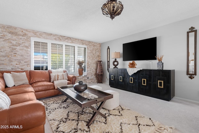 9621 E Calgary Ave, Sun Lakes, AZ 85248 - carpeted living area with a textured ceiling and baseboards