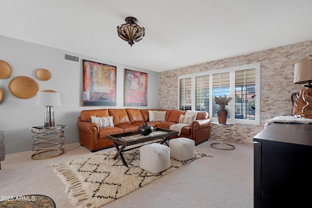 9621 E Calgary Ave, Sun Lakes, AZ 85248 - carpeted living area with a textured ceiling