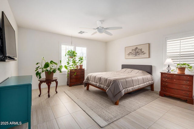 1874 E Mesquite Ave, Apache Junction, AZ 85119 - bedroom with a ceiling fan and baseboards