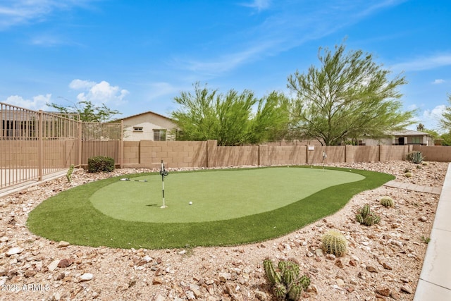 1874 E Mesquite Ave, Apache Junction, AZ 85119 - fenced backyard with an area to practice putting