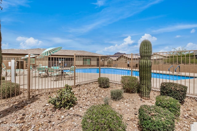 1874 E Mesquite Ave, Apache Junction, AZ 85119 - community pool featuring a patio
