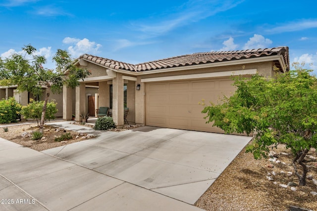 1874 E Mesquite Ave, Apache Junction, AZ 85119 - view of front facade with stucco siding, driveway, a garage, and a tiled roof