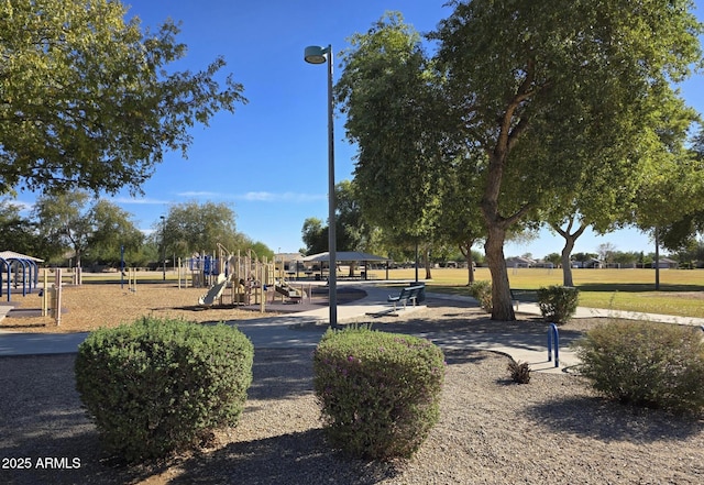 view of home's community with a playground