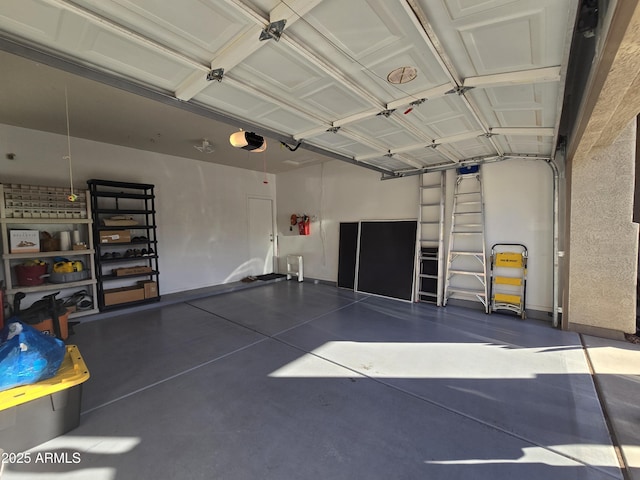 garage featuring a garage door opener