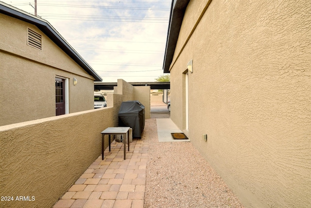 view of home's exterior with a patio area