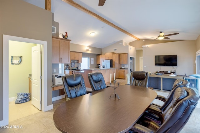 tiled dining area featuring lofted ceiling with beams and ceiling fan